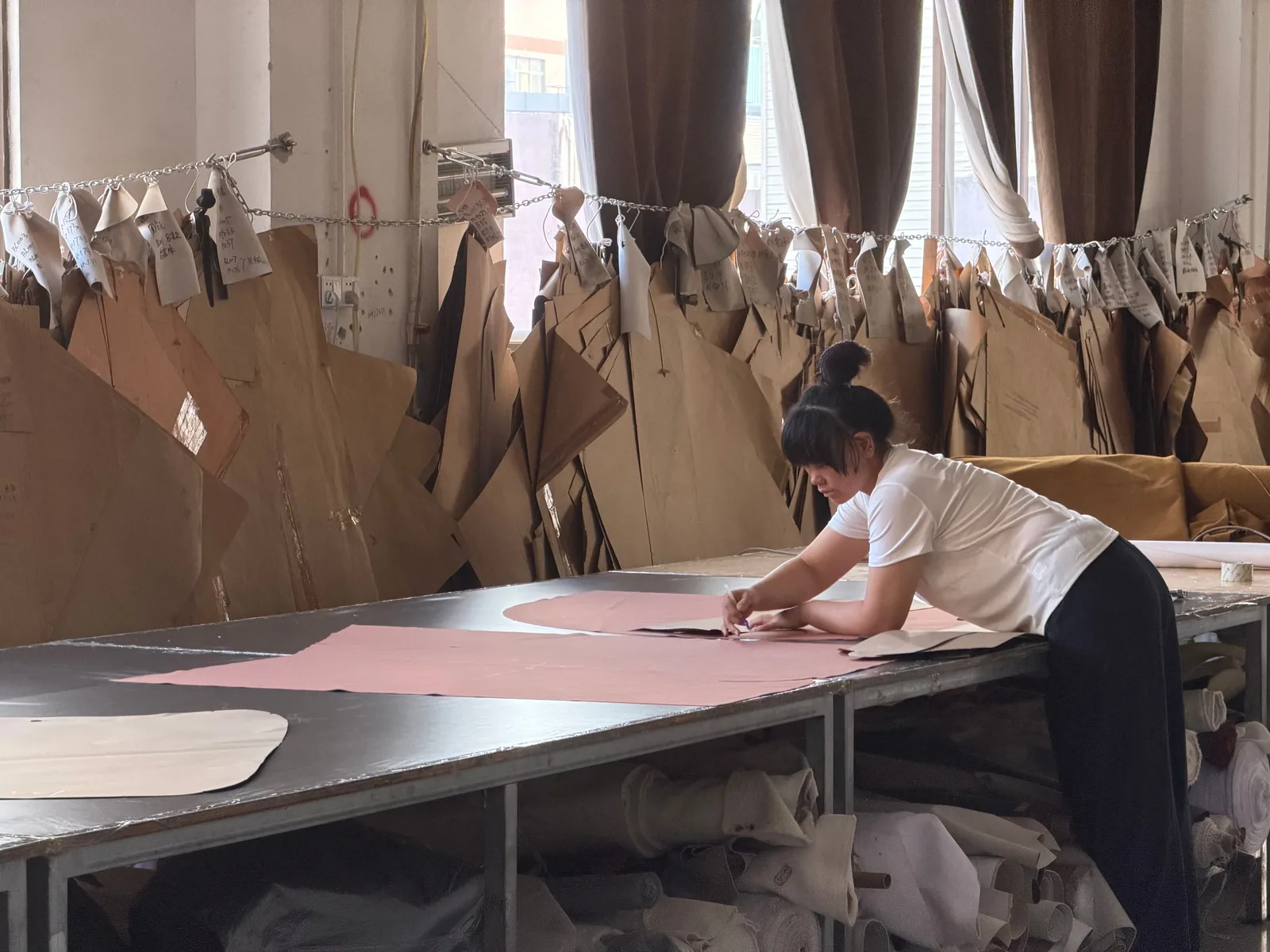 Upholstery fabric pattern cutting before sewing and assembly