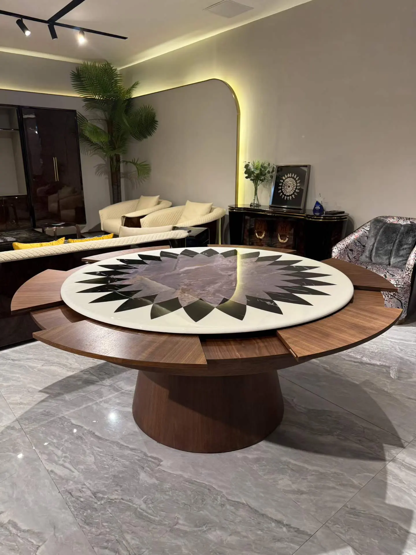 Custom round dining table with wood veneer and decorative stone inlay