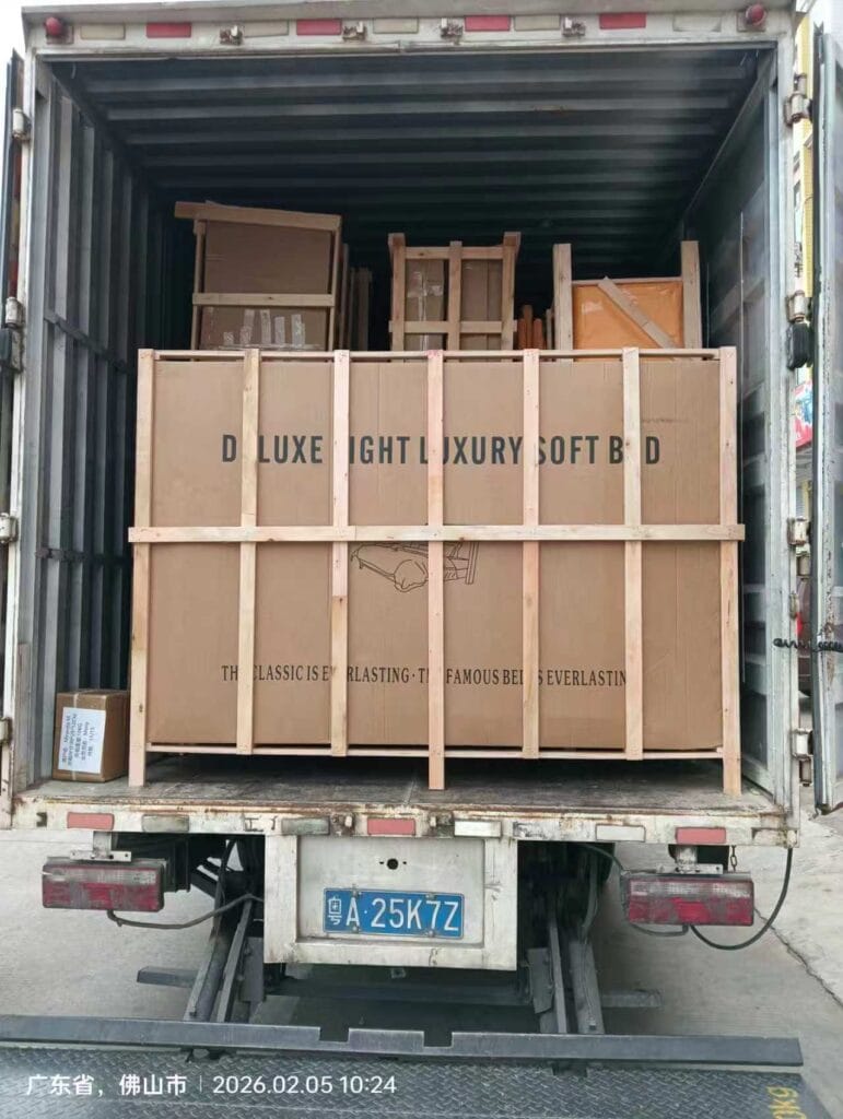 Wooden crates loaded for furniture export at Lenatees in Foshan