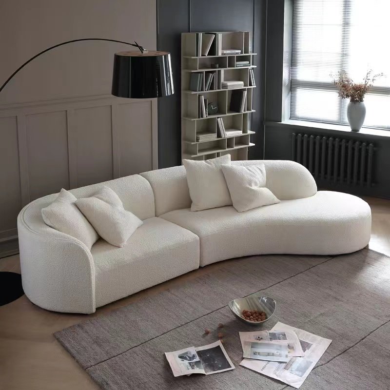 FX8008 archive view A: cream curved sofa with extended rounded end on the viewer’s right.