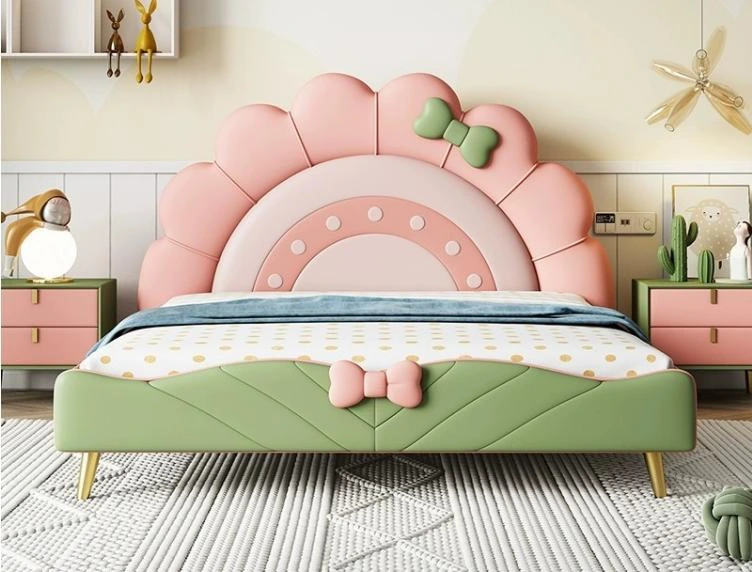 L43 bed with a scalloped pink flower headboard, green bow, and green footboard with a pink bow