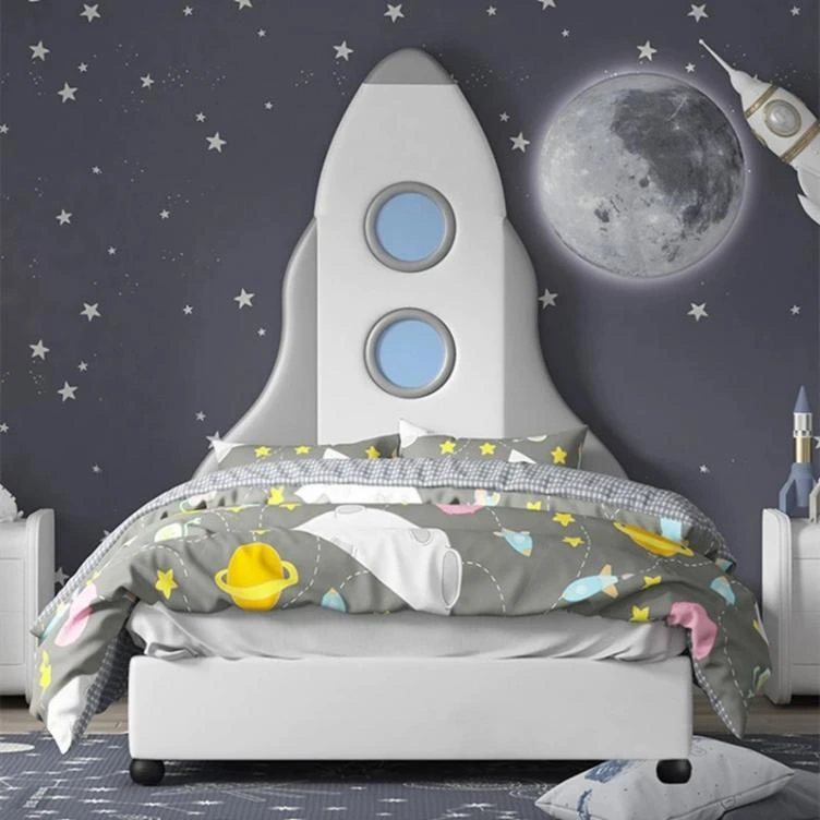 L55 bed with a white rocket headboard, two blue circular windows, and a white footboard on dark round feet