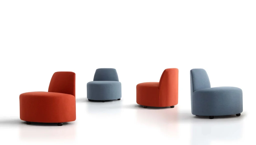 Rust-red and muted blue LC25-09 armless lounge chairs showing front and side views against a white background