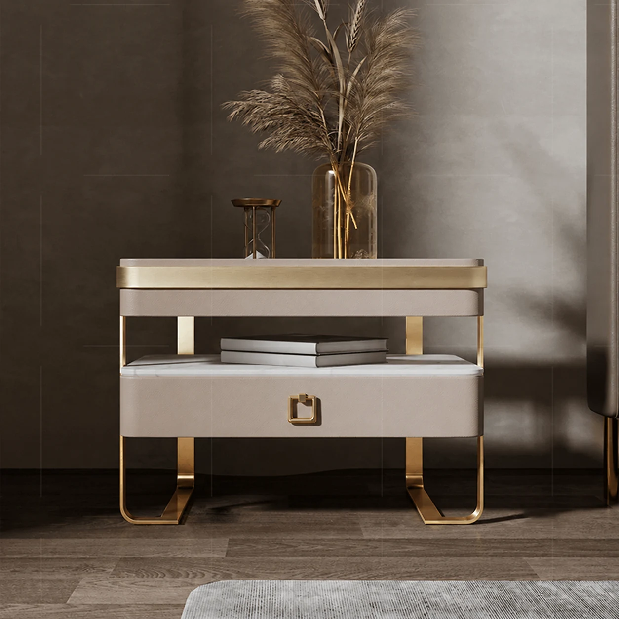 Beige bedside table with a gold rim, an open shelf, a drawer with a square handle and gold U-shaped legs