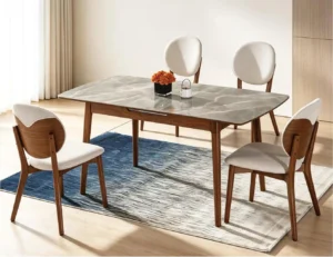 SYL601 dining table with a pale veined top and four Y71 upholstered chairs in a bright dining room