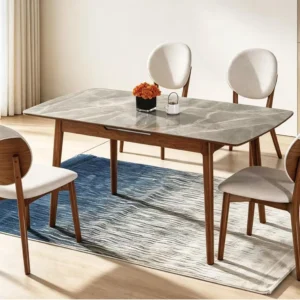 SYL601 dining table with a pale veined top and four Y71 upholstered chairs in a bright dining room